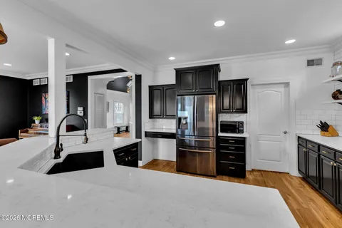 a utility room with closet dryer and washer