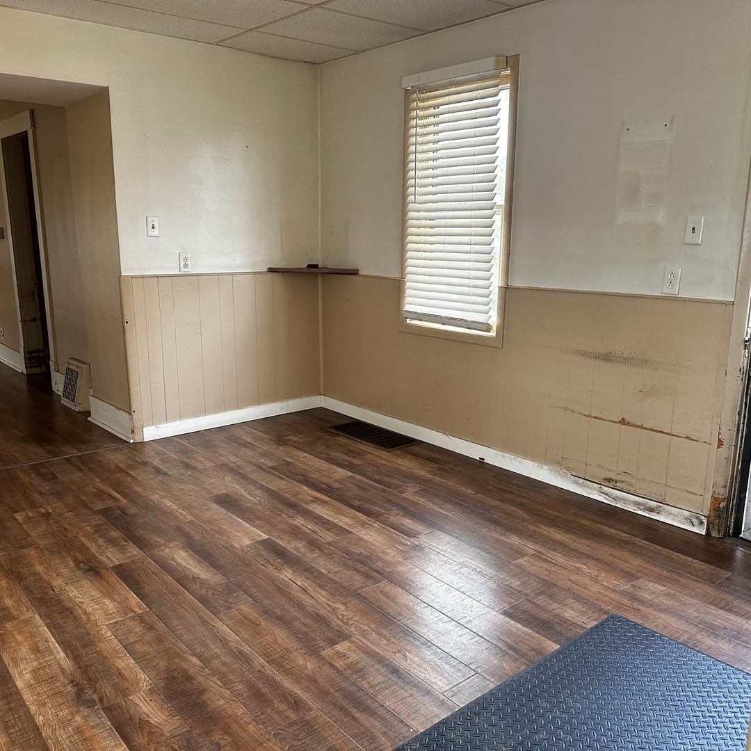408 Marcy Street Ottawa, IL 61350 - Photo 19 of 25 an empty room with wooden floor and windows
