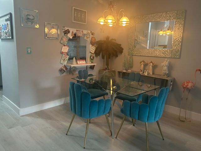 a view of a dining room with furniture