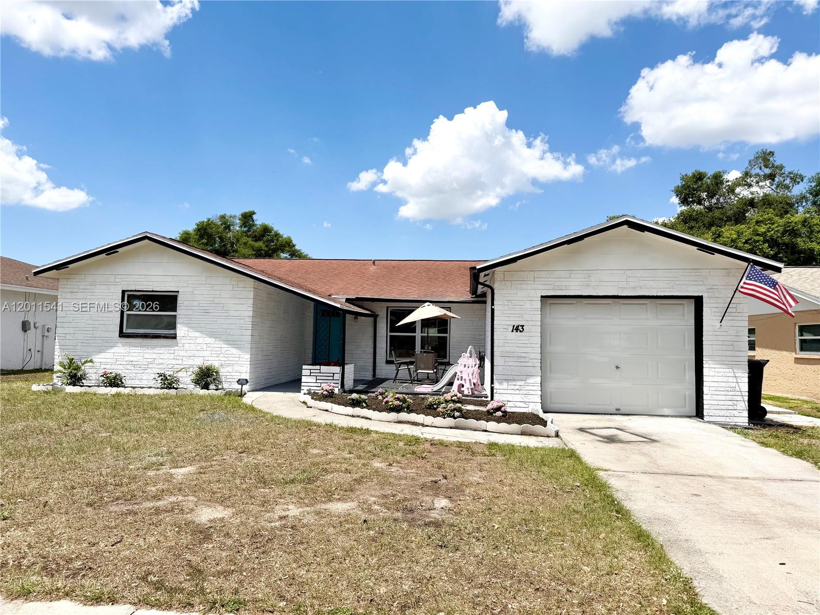 143 Valley Circle Brandon, FL 33510 - Photo 2 of 21 a view of a house with a backyard