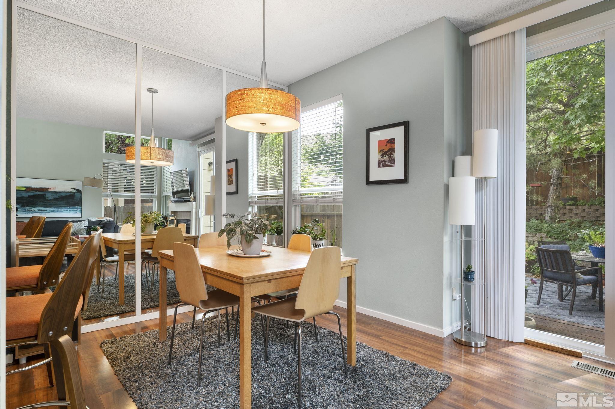 4391 Loreto Lane Reno, NV 89502 - Photo 11 of 39 a view of a dining room with furniture window and outside view
