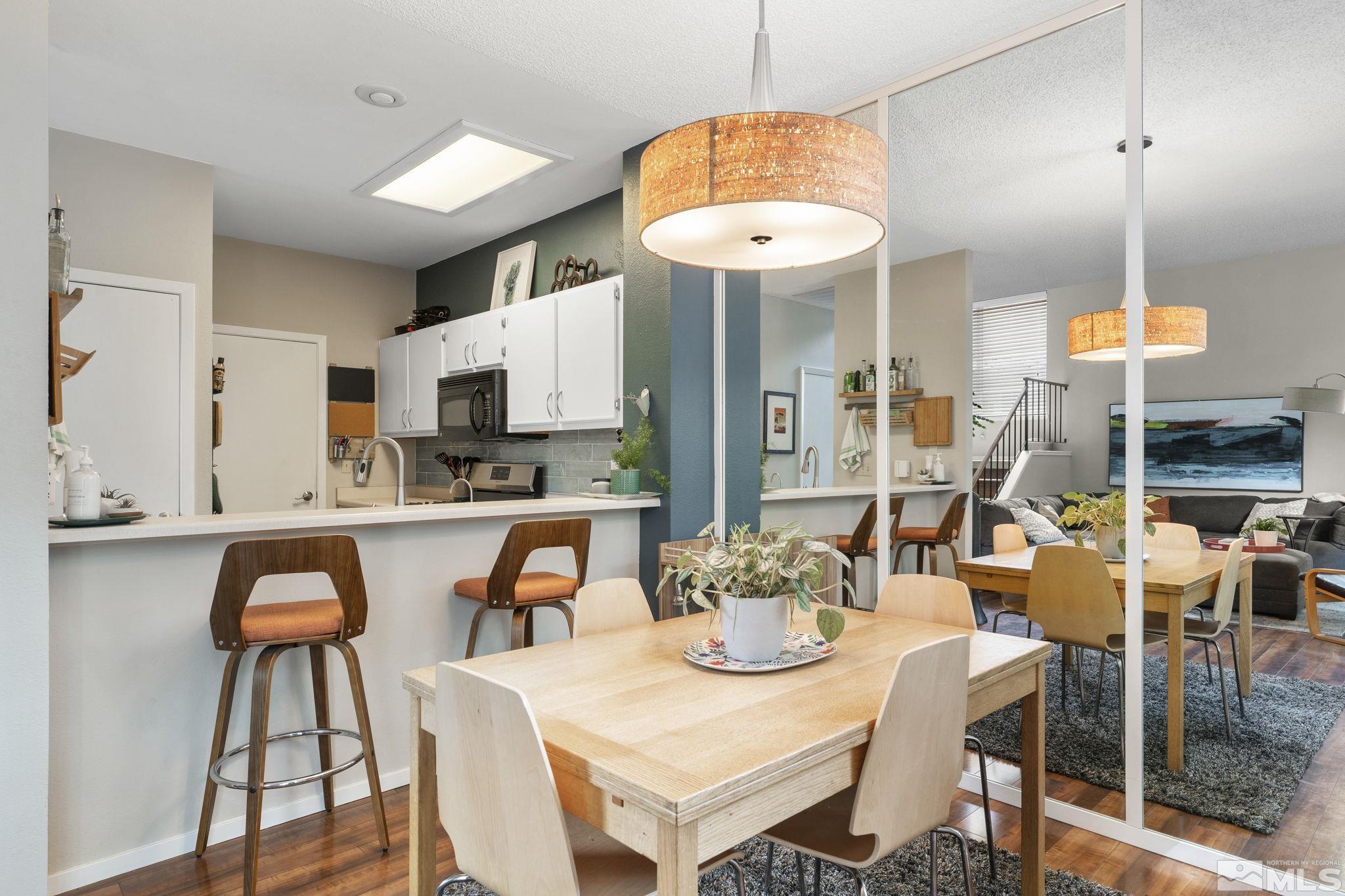 4391 Loreto Lane Reno, NV 89502 - Photo 12 of 39 a view of dining table and chairs