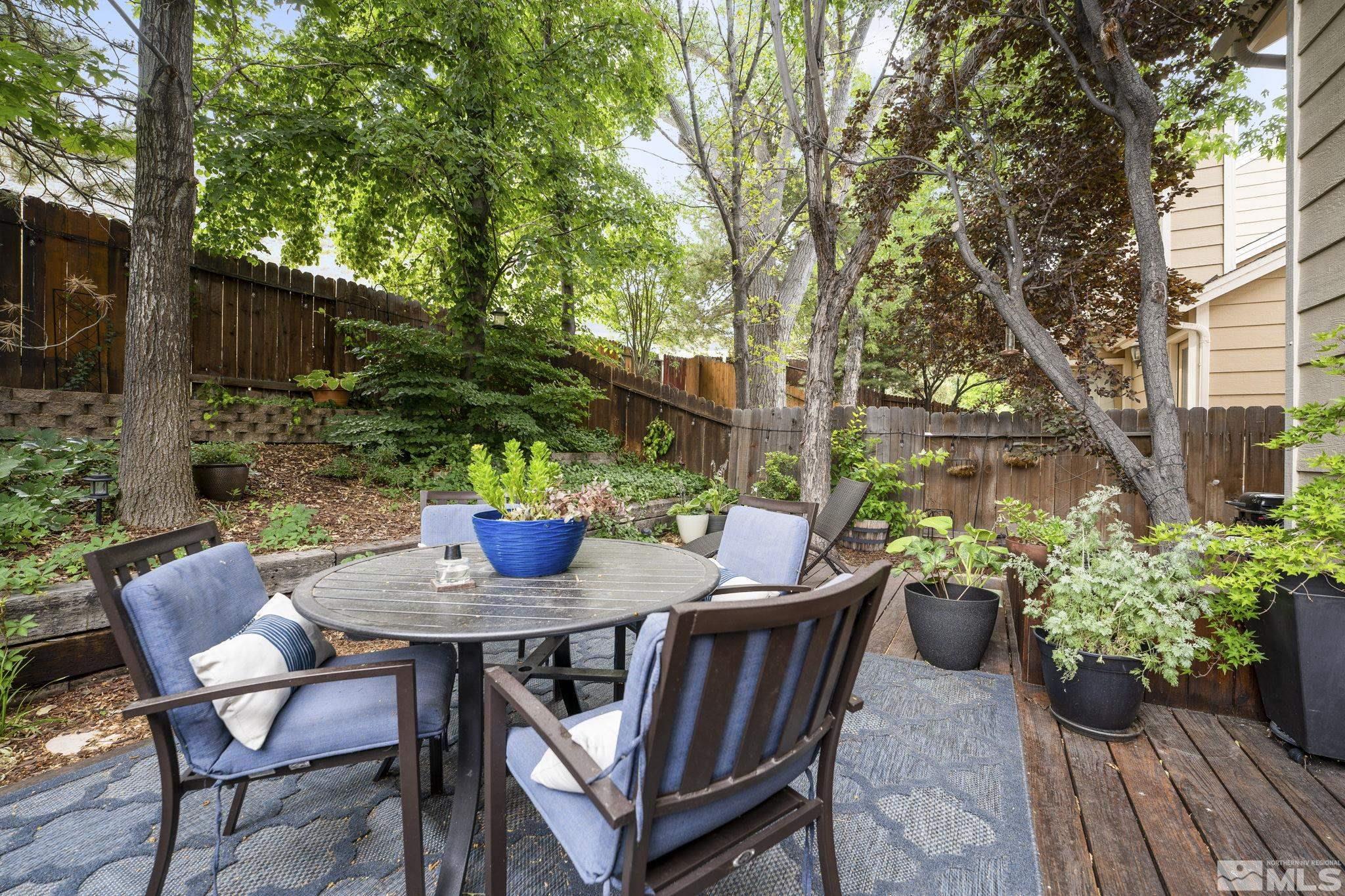 4391 Loreto Lane Reno, NV 89502 - Photo 34 of 39 a view of a patio with furniture and a potted plant