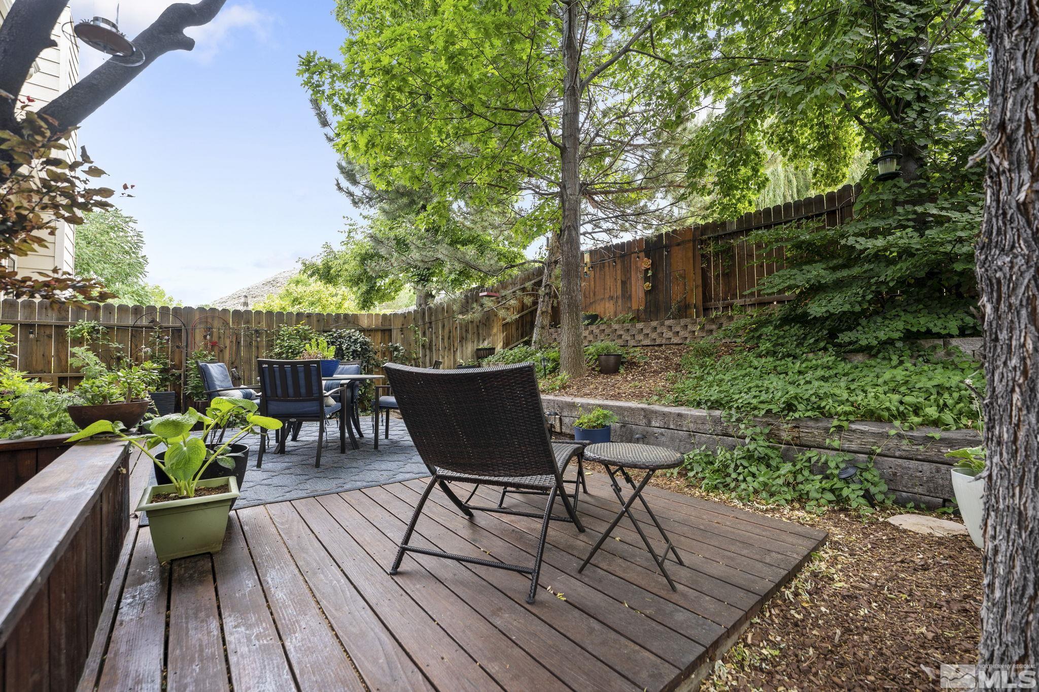 4391 Loreto Lane Reno, NV 89502 - Photo 38 of 39 a view of a chairs and table on the wooden deck