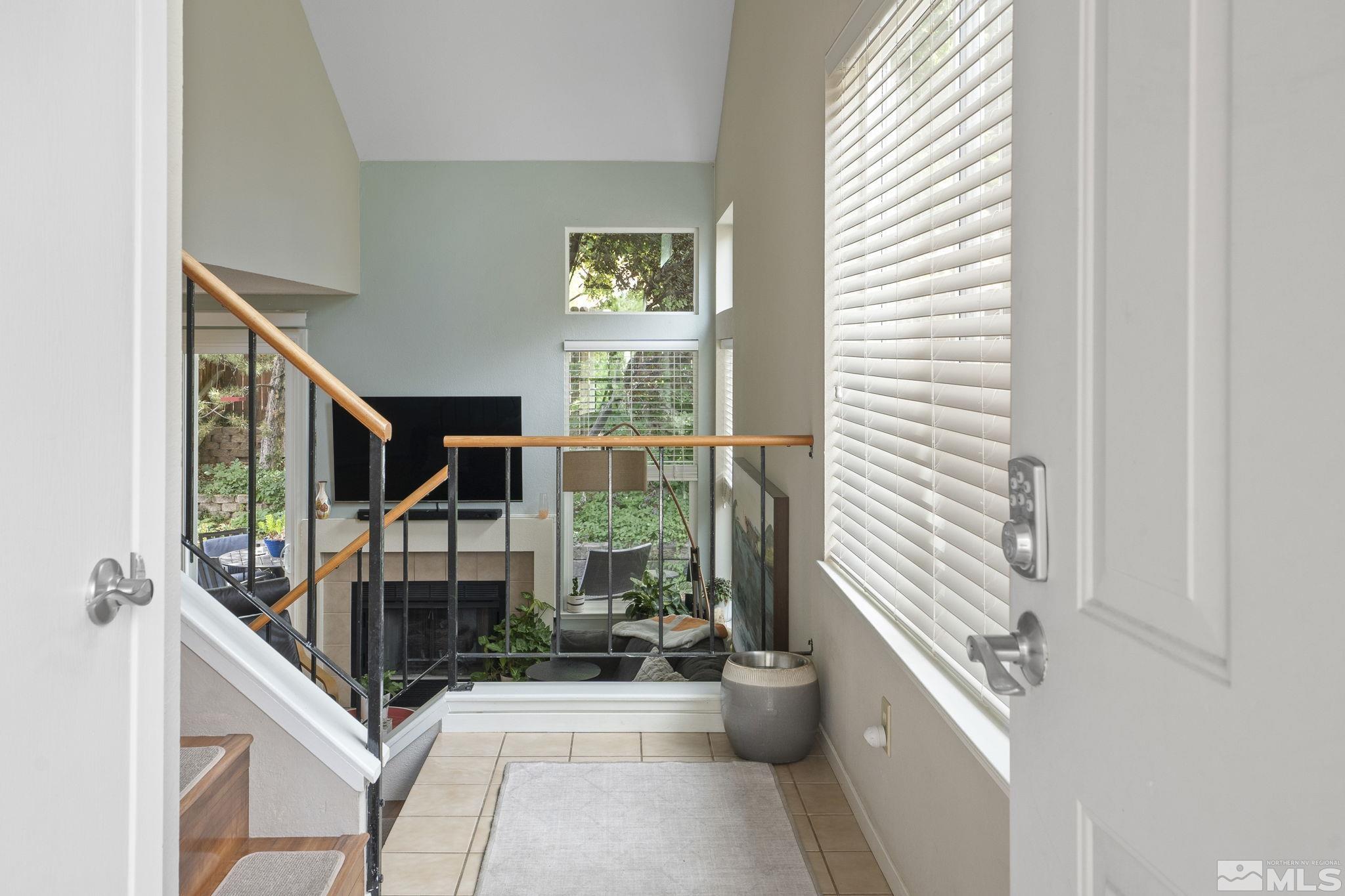4391 Loreto Lane Reno, NV 89502 - Photo 4 of 39 a view of living room kitchen and windows