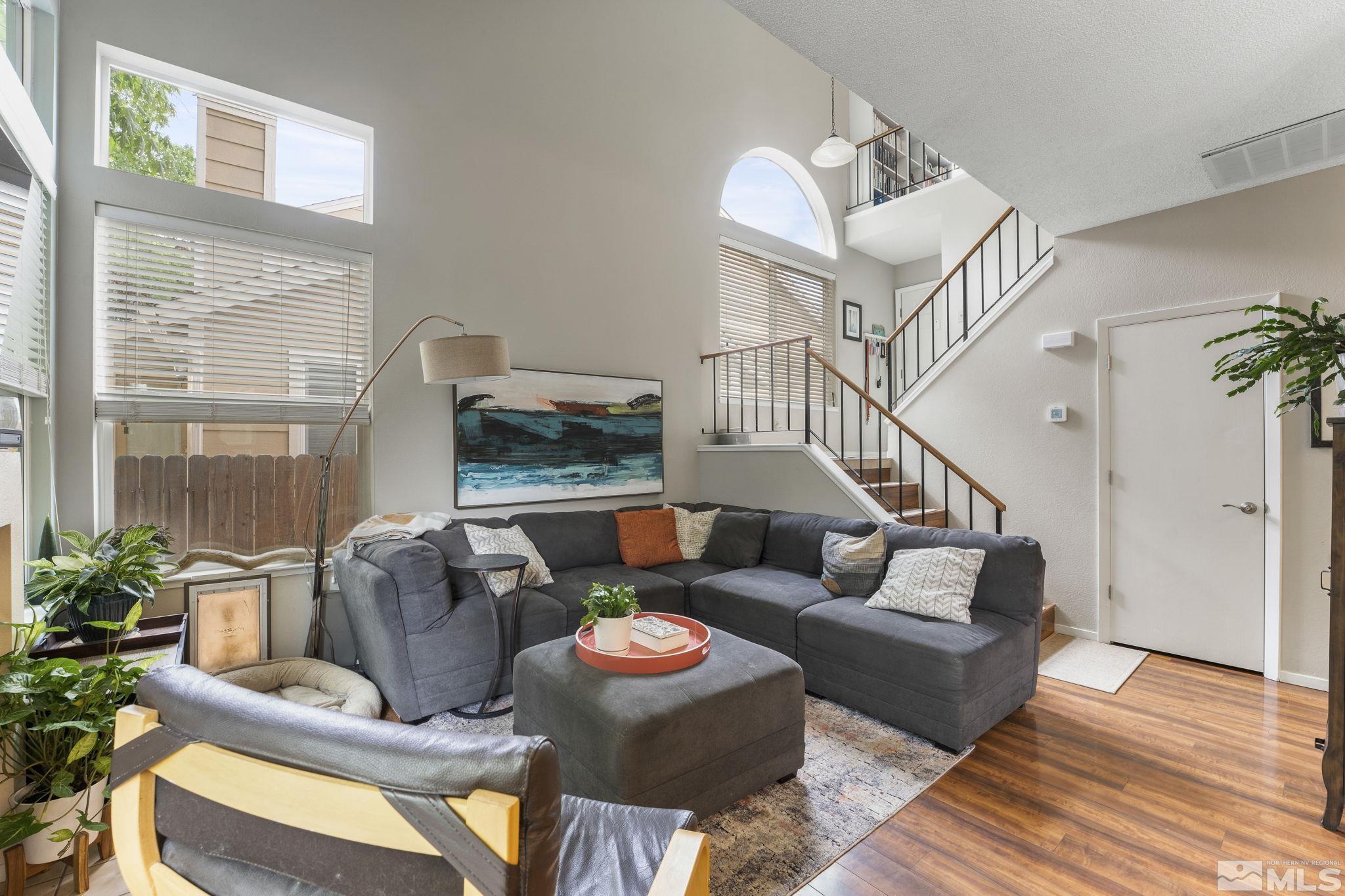4391 Loreto Lane Reno, NV 89502 - Photo 8 of 39 a living room with furniture and a large window