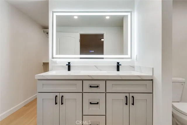 a bathroom with a shower and toilet