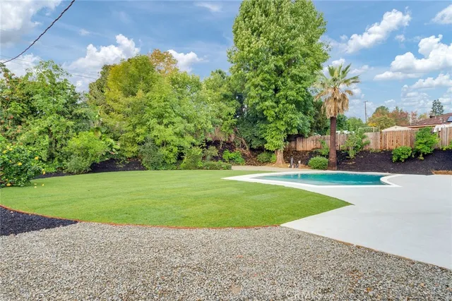 a front view of house with yard and seating area