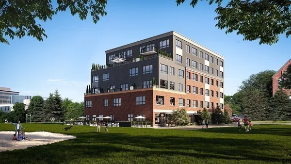 a view of a building with a yard