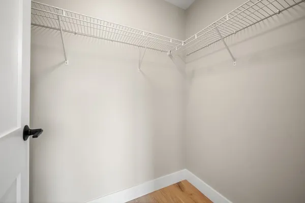 a view of a room with racks on the wall