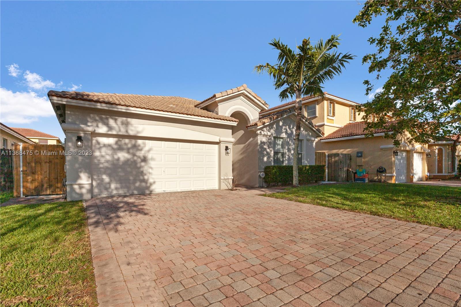 24547 Southwest 109th Avenue Homestead, FL 33032 - Photo 1 of 20 a view of a house with a yard