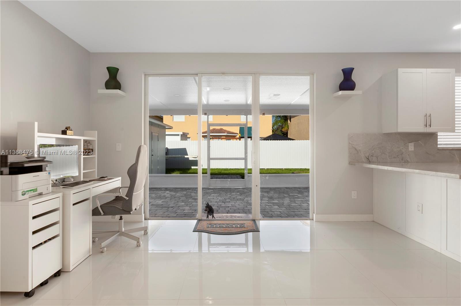 24547 Southwest 109th Avenue Homestead, FL 33032 - Photo 13 of 20 a room with a walk in closet and a window