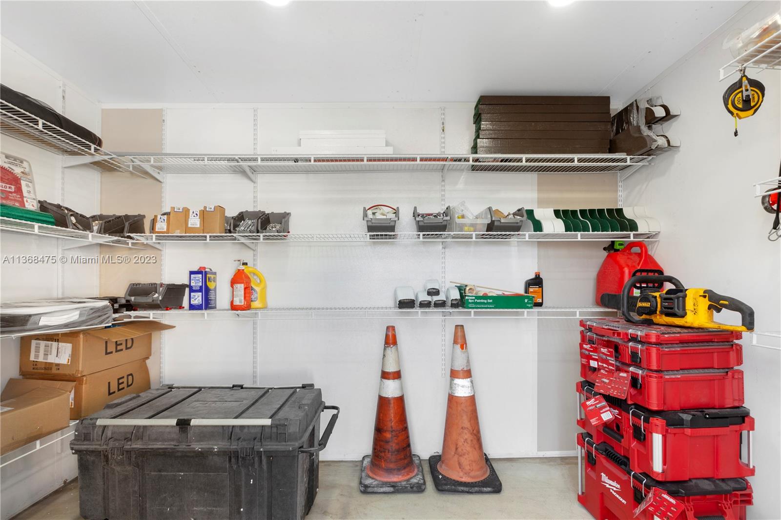 24547 Southwest 109th Avenue Homestead, FL 33032 - Photo 15 of 20 a room with storage and utility