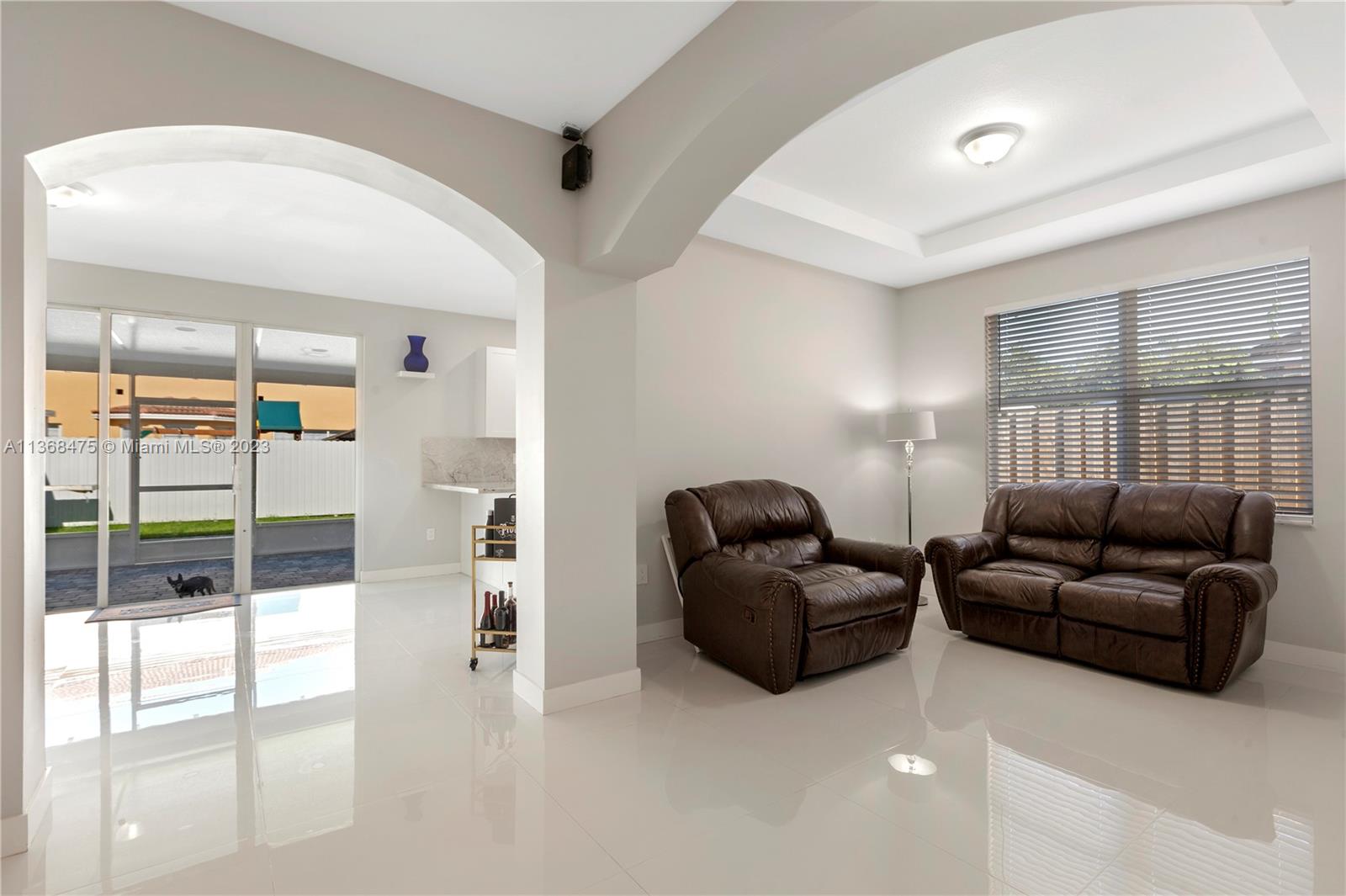 24547 Southwest 109th Avenue Homestead, FL 33032 - Photo 4 of 20 a living room with furniture