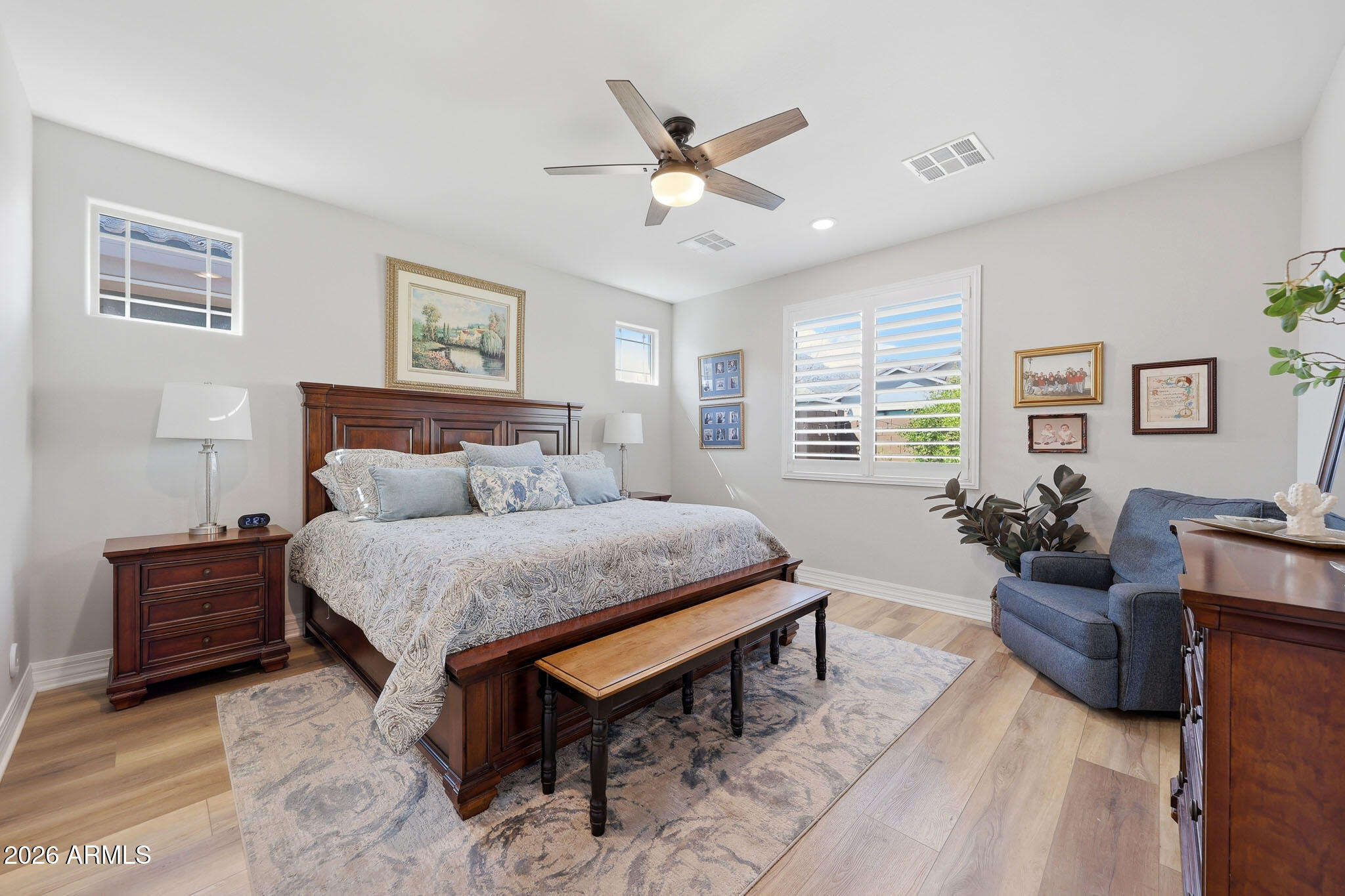 20636 West Luke Avenue Buckeye, AZ 85396 - Photo 12 of 42 a bedroom with furniture and a window