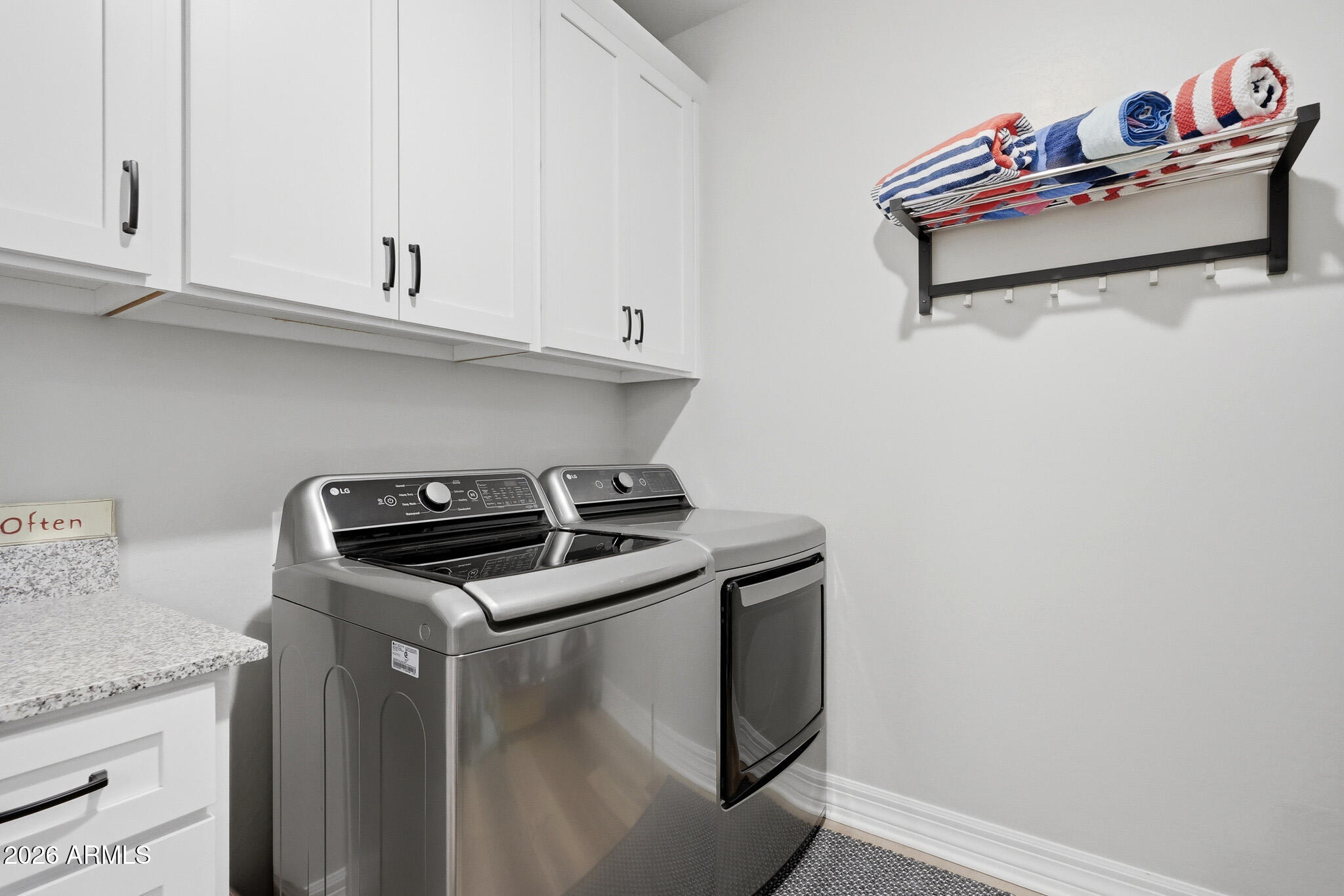 20636 West Luke Avenue Buckeye, AZ 85396 - Photo 20 of 42 a utility room with dryer and washer