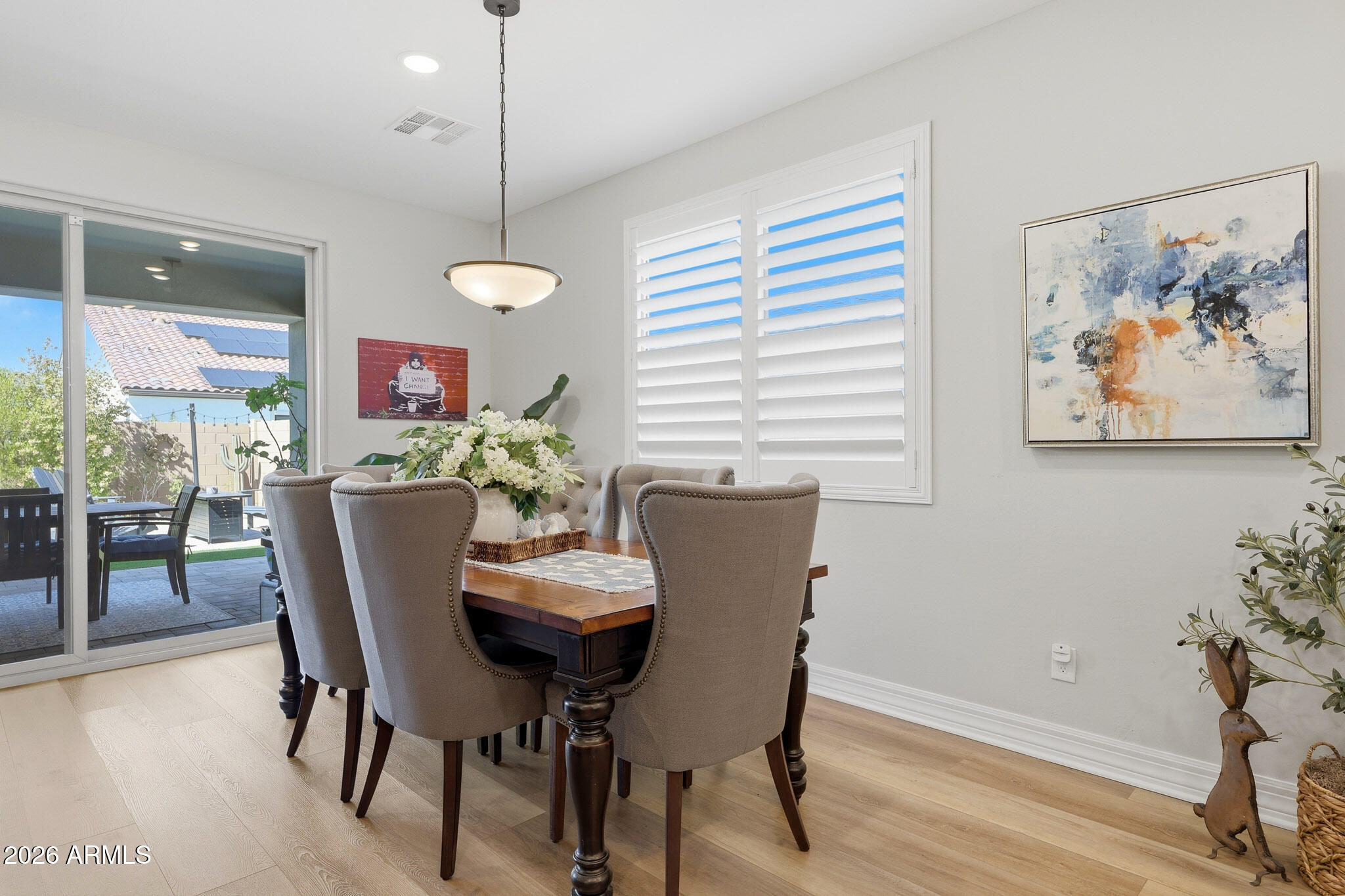 20636 West Luke Avenue Buckeye, AZ 85396 - Photo 9 of 42 a dining room with furniture and window