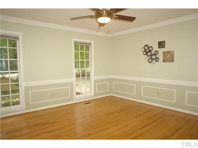 8508 Seagate Drive Raleigh, NC 27615 - Photo 4 of 25 a view of an empty room with a window
