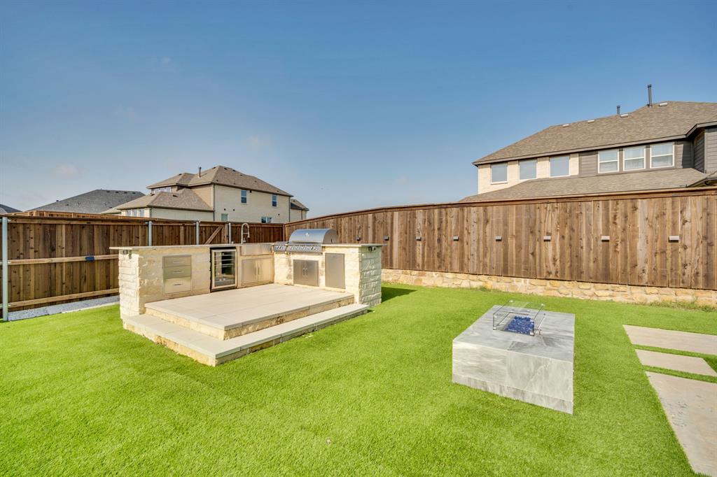 1516 M3 Ranch Road Mansfield, TX 76063 - Photo 37 of 40 Gourmet outdoor kitchen and fire pit is ready for those summer nights!