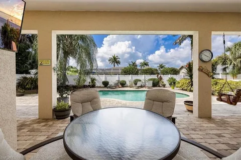 a view of a living room and dining room