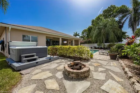 a house view with a backyard space