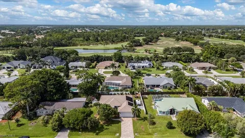 a view of a lake with a city