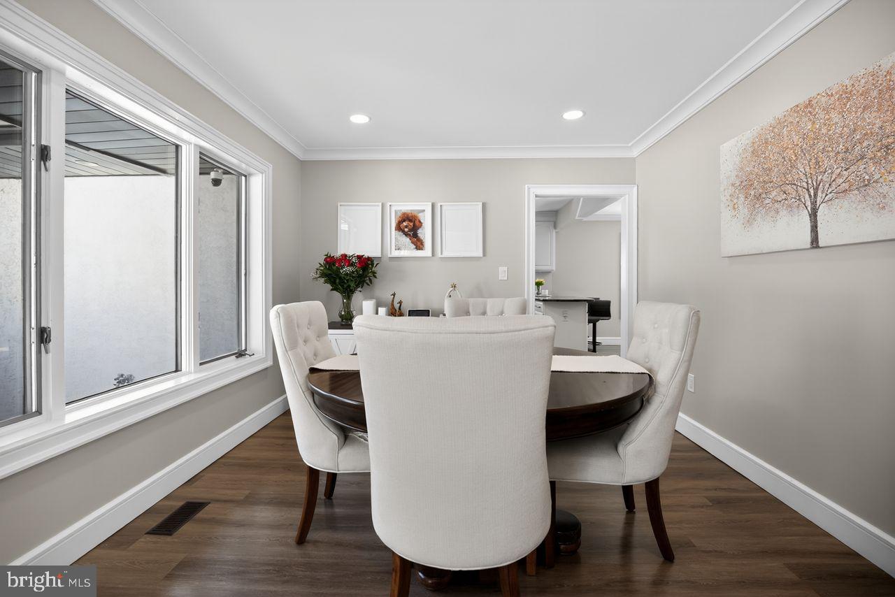 4304 Bridgeboro Road Moorestown, NJ 08057 - Photo 15 of 40 a dining room with furniture and wooden floor
