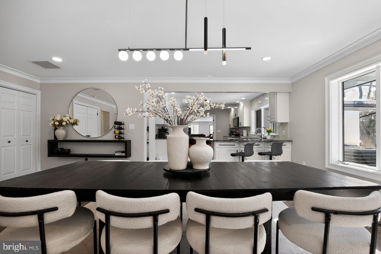 4304 Bridgeboro Road Moorestown, NJ 08057 - Photo 17 of 40 a view of a dining room with furniture and window