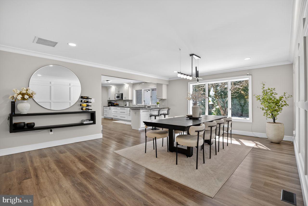 4304 Bridgeboro Road Moorestown, NJ 08057 - Photo 19 of 40 a living room with furniture a window and a table