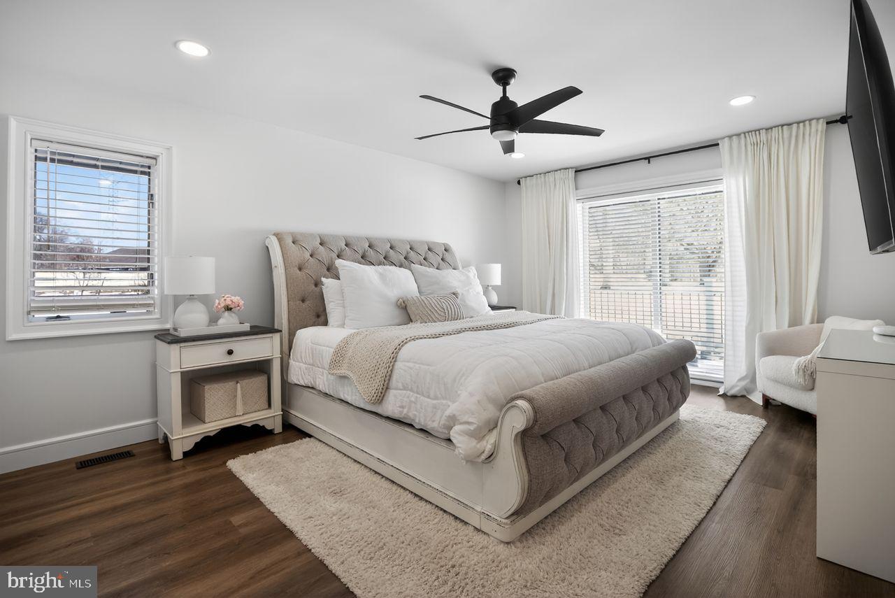 4304 Bridgeboro Road Moorestown, NJ 08057 - Photo 23 of 40 a bedroom with a large bed and a window