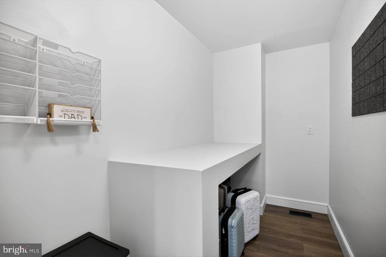 4304 Bridgeboro Road Moorestown, NJ 08057 - Photo 28 of 40 a hallway with a bench in it