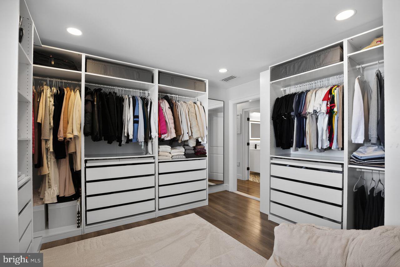 4304 Bridgeboro Road Moorestown, NJ 08057 - Photo 30 of 40 a view of walk in closet with clothes and shoes