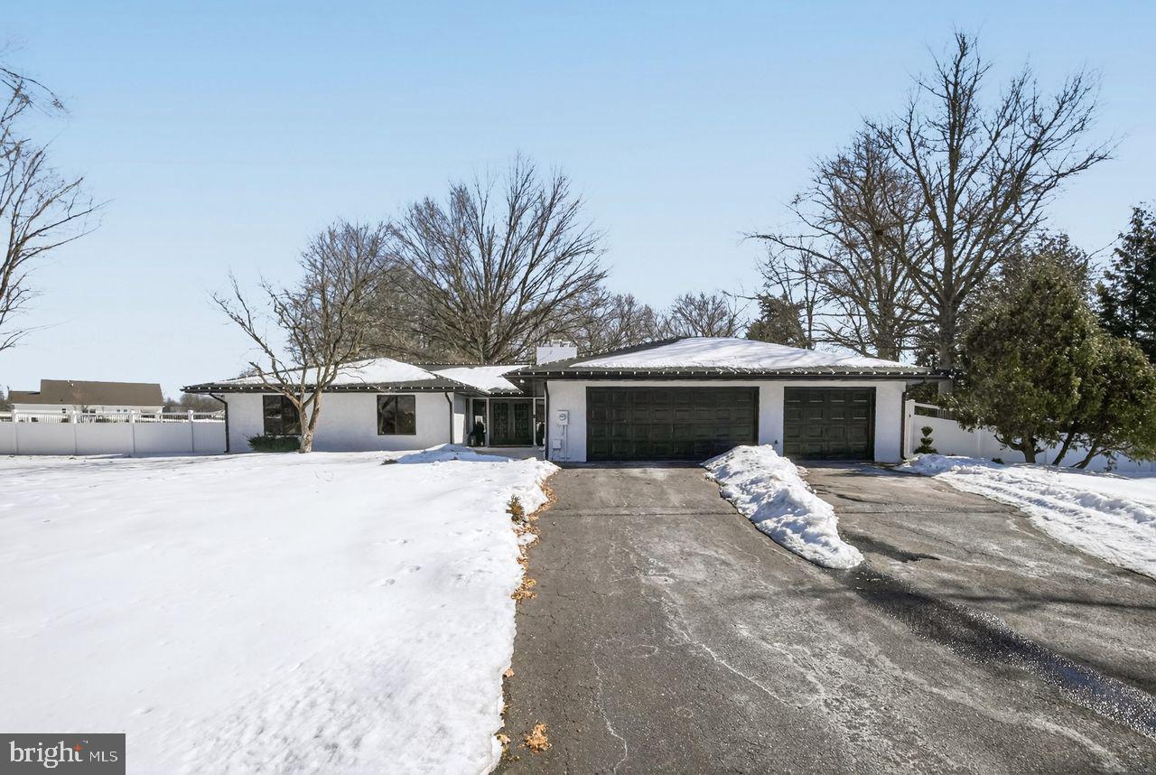 4304 Bridgeboro Road Moorestown, NJ 08057 - Photo 3 of 40 a front view of a house with a yard