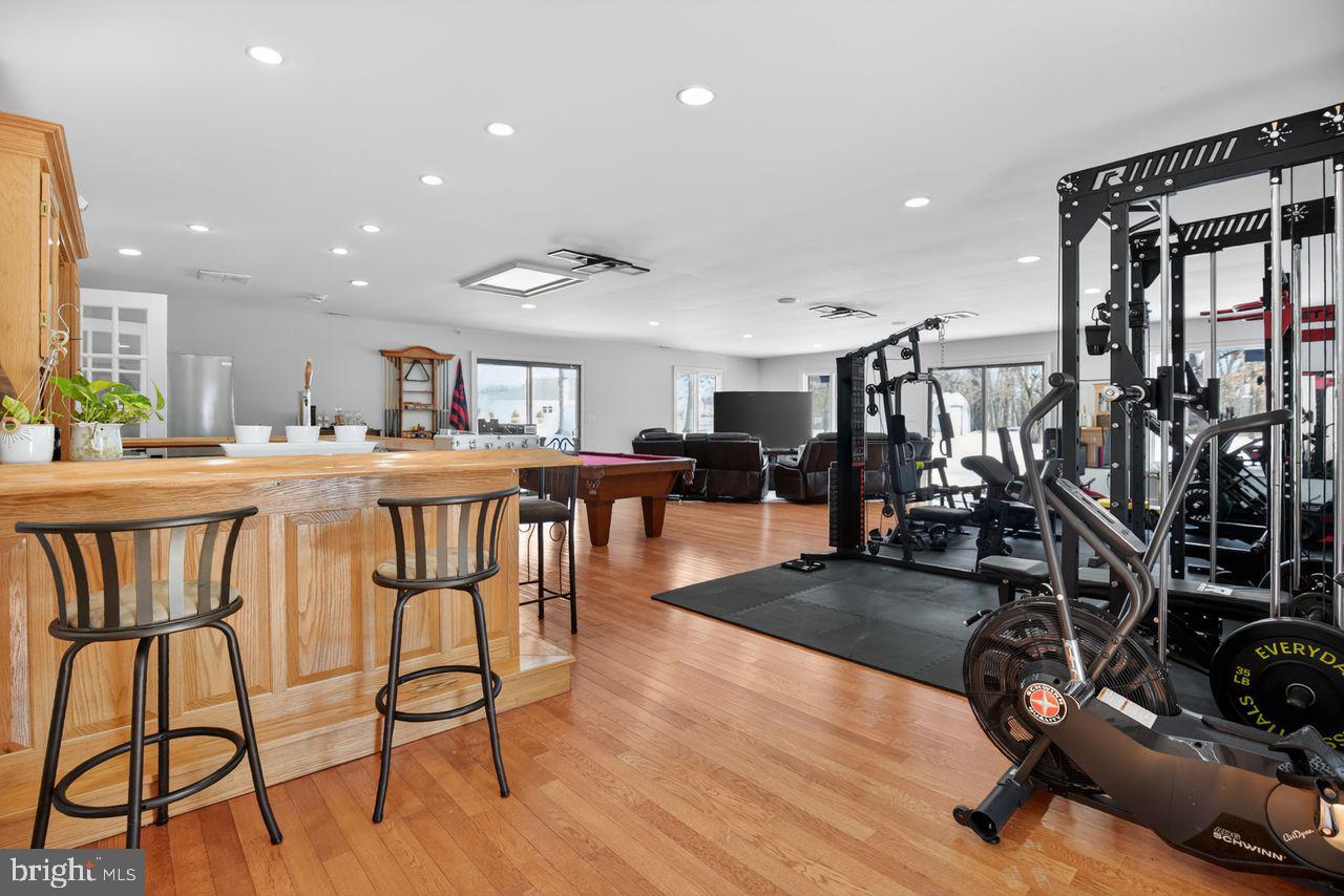 4304 Bridgeboro Road Moorestown, NJ 08057 - Photo 33 of 40 a dining room with furniture and wooden floor