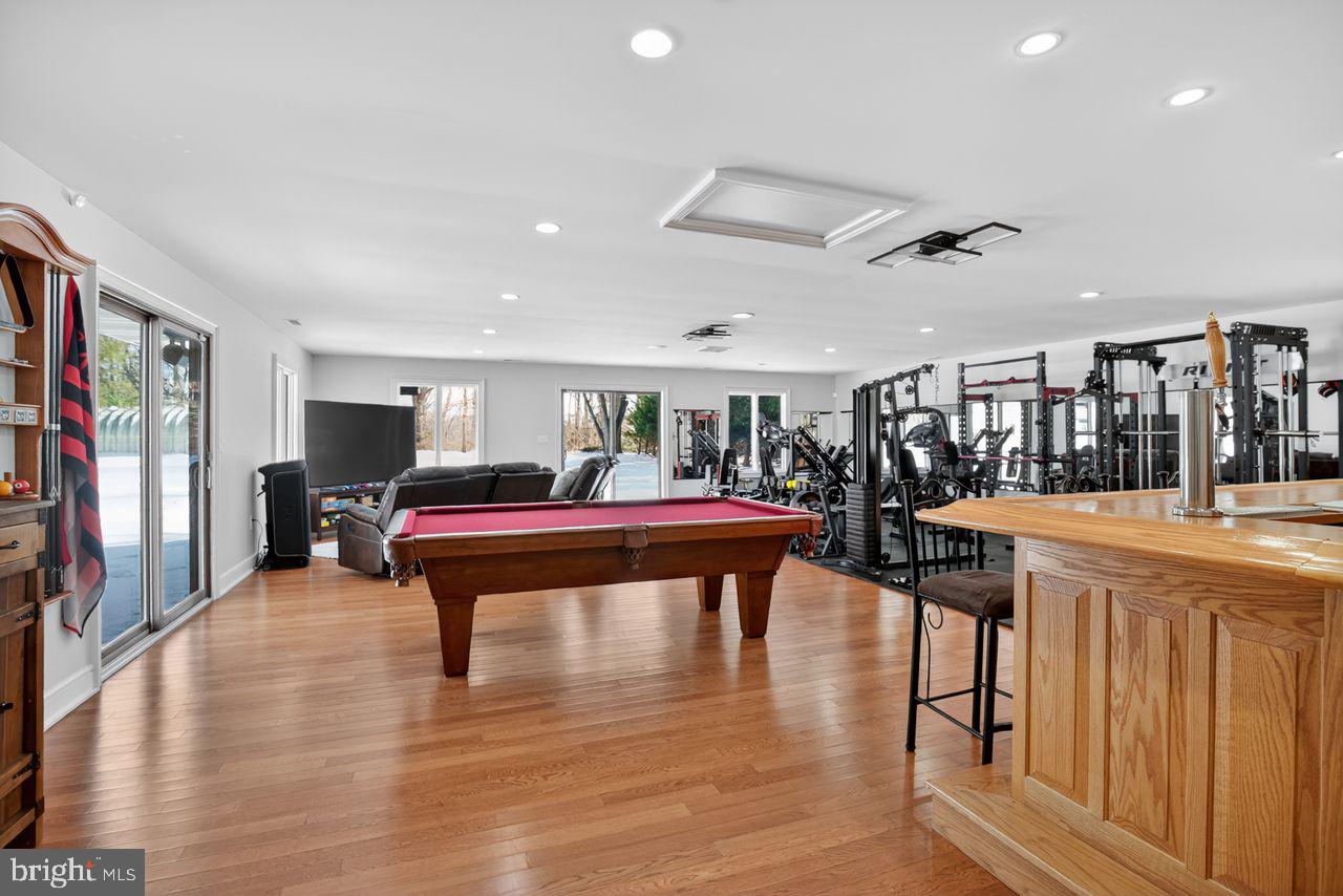 4304 Bridgeboro Road Moorestown, NJ 08057 - Photo 34 of 40 a room with lots of furniture and view kitchen