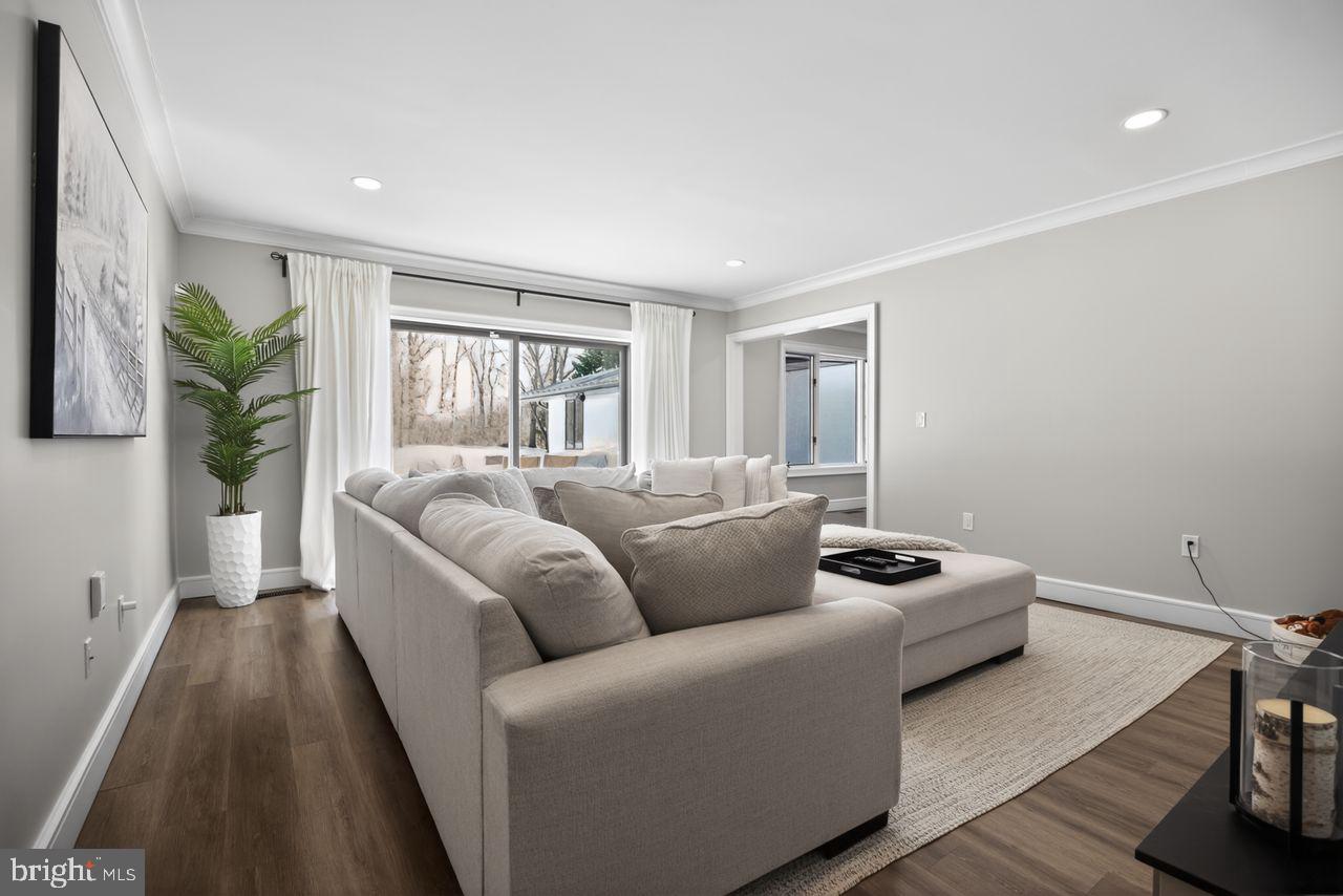 4304 Bridgeboro Road Moorestown, NJ 08057 - Photo 5 of 40 a living room with furniture and a window
