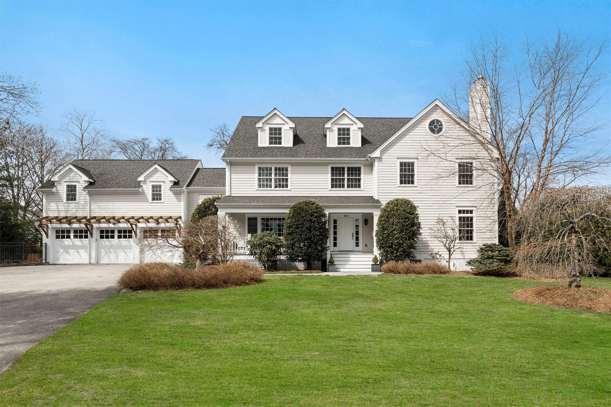 803 Oakwood Road Mamaroneck, NY 10543 - Photo 1 of 1 a front view of house with yard and green space