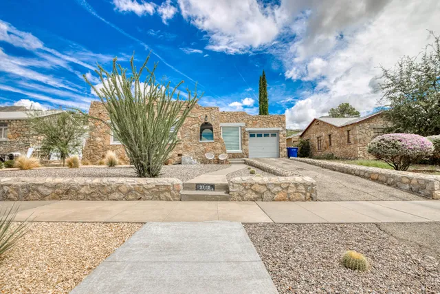 a view of a backyard of the house