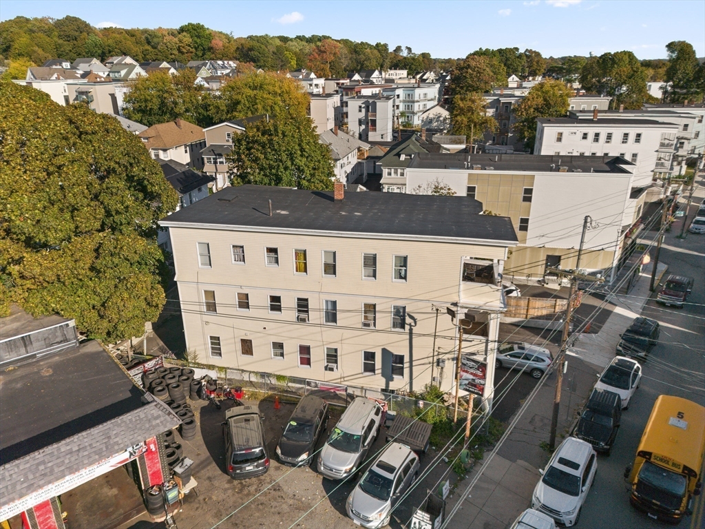 339-341 Lawrence Street Lawrence, MA 01841 - Photo 15 of 20 an aerial view of a building with mountain view