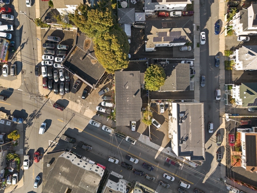 339-341 Lawrence Street Lawrence, MA 01841 - Photo 16 of 20 an aerial view of residential houses with outdoor space