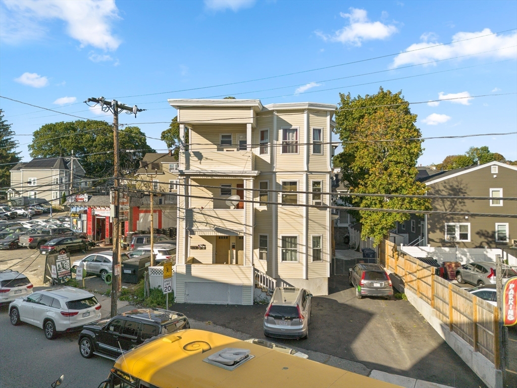 339-341 Lawrence Street Lawrence, MA 01841 - Photo 19 of 20 a view of a house with swimming pool