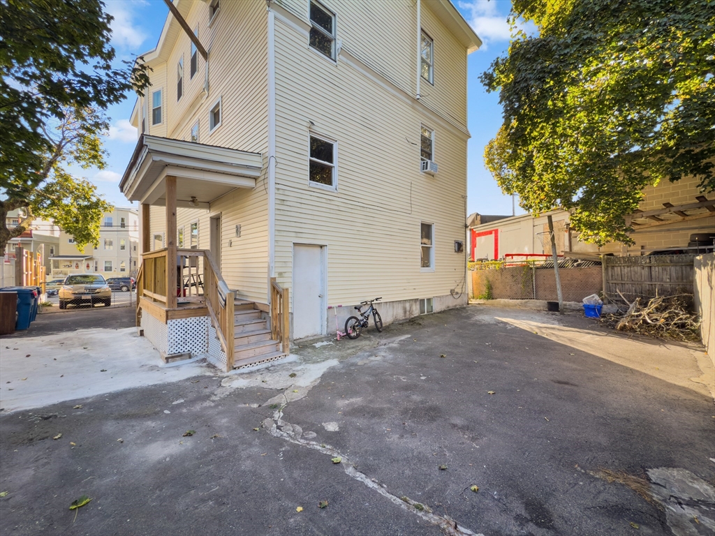 339-341 Lawrence Street Lawrence, MA 01841 - Photo 20 of 20 a view of back yard of the house