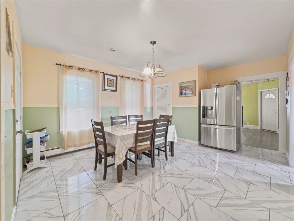 339-341 Lawrence Street Lawrence, MA 01841 - Photo 5 of 20 a dining room well furnished