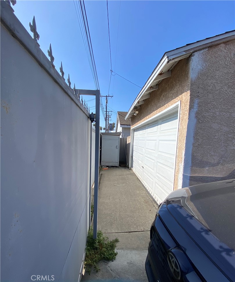 5846 Gardenia Avenue Long Beach, CA 90805 - Photo 11 of 28 a view of house with stairs and wooden floor