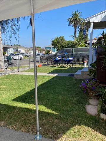 a view of yard with patio