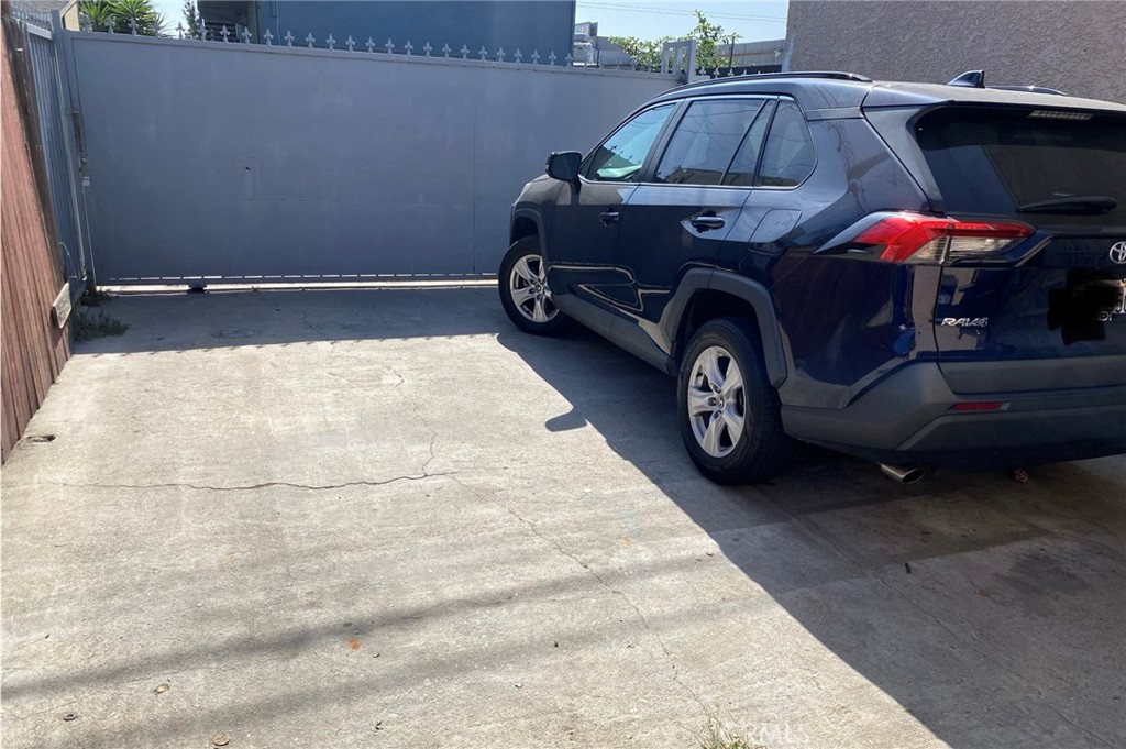 5846 Gardenia Avenue Long Beach, CA 90805 - Photo 8 of 28 a car parked in garage