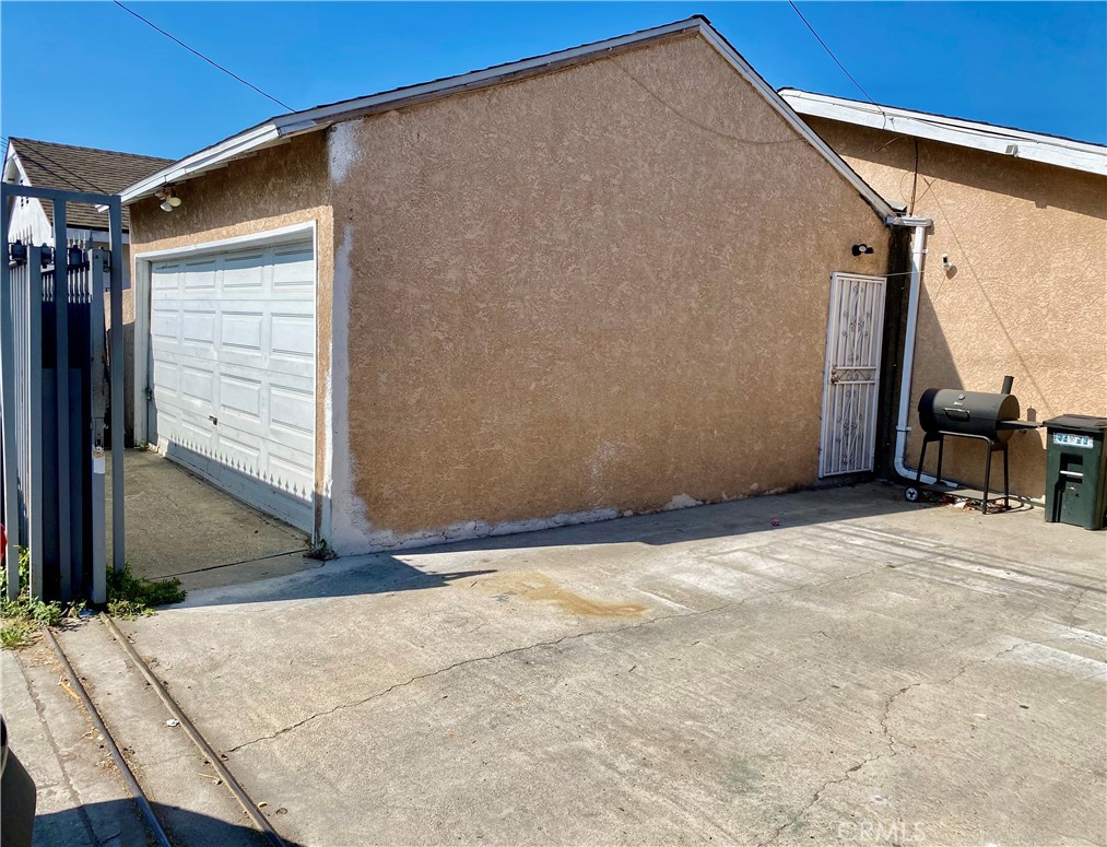 5846 Gardenia Avenue Long Beach, CA 90805 - Photo 10 of 28 a view of a house with a backyard
