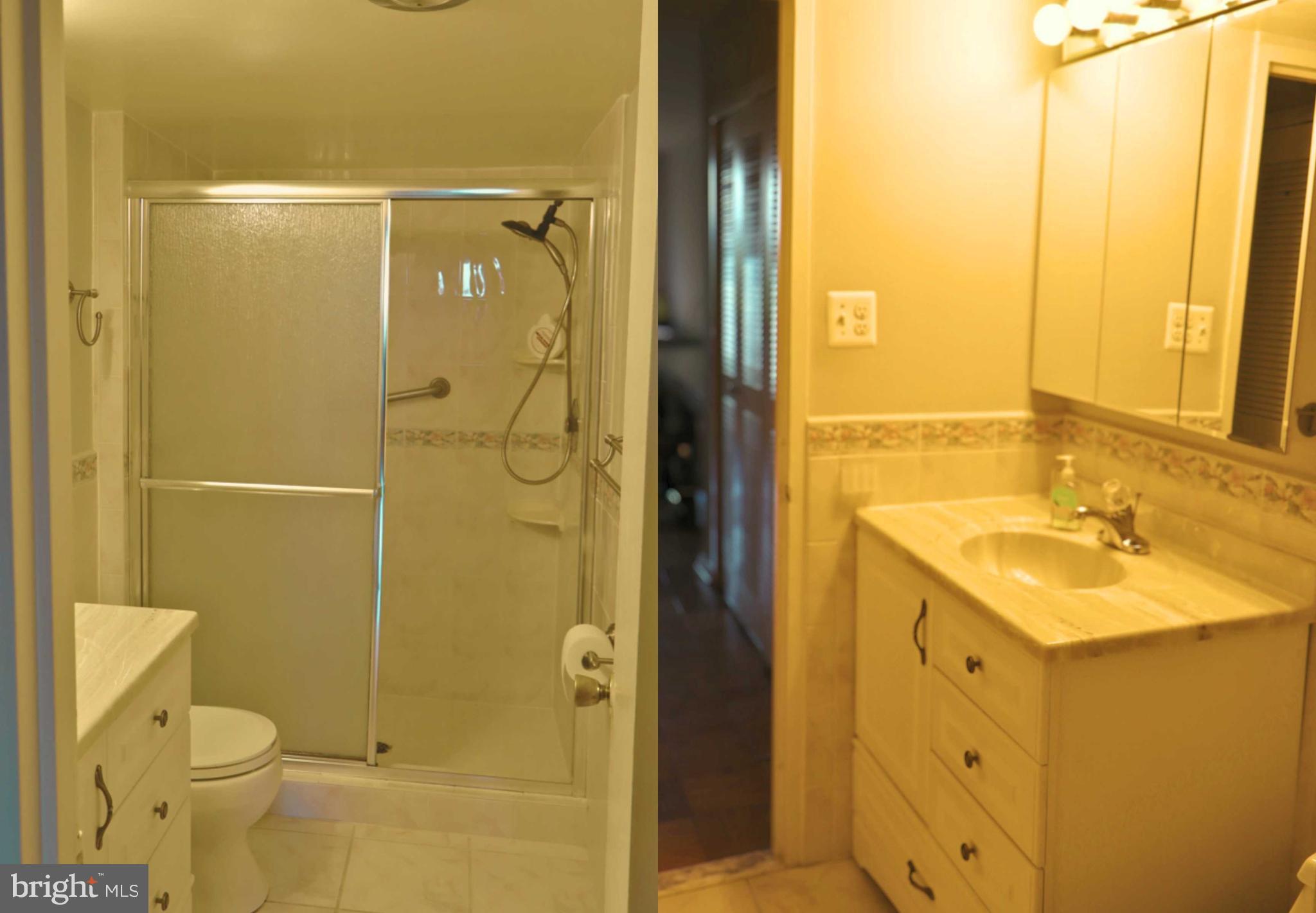 5101 River Road, Unit 405 Bethesda, MD 20816 - Photo 14 of 20 a bathroom with a sink mirror toilet and shower