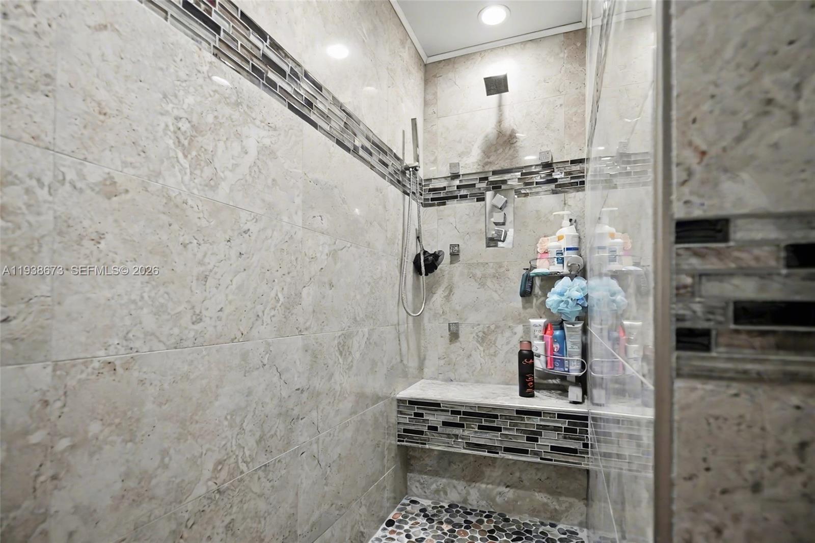 13574 Southwest 49th Lane Miami, FL 33175 - Photo 23 of 36 a bathroom with a shower