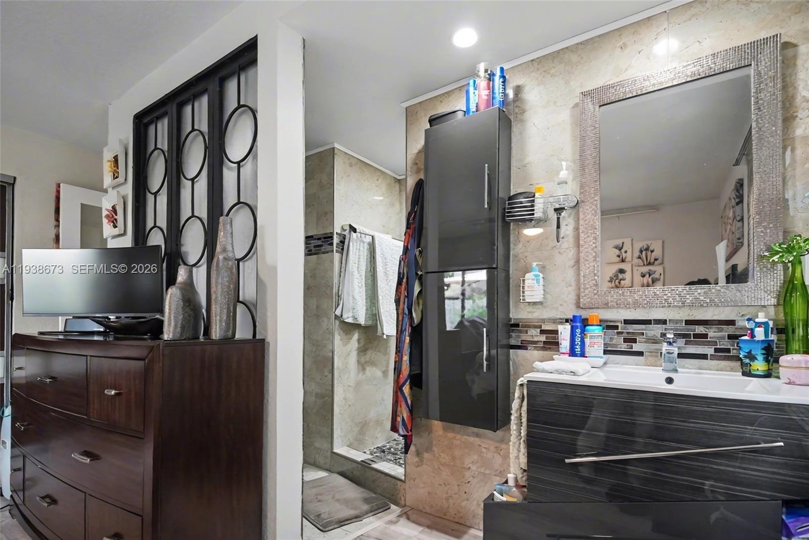 13574 Southwest 49th Lane Miami, FL 33175 - Photo 24 of 36 a kitchen view of a refrigerator and a stove